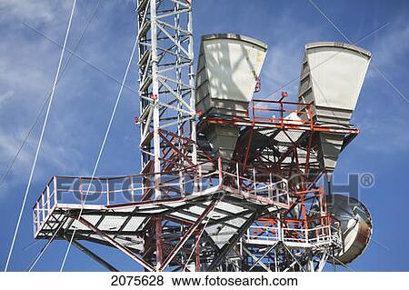 Stock Photo - Close Up Of Telecommunications Tower And Blue Sky; Alberta Canada. Fotosearch