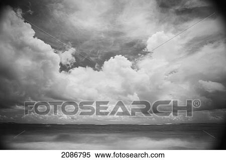 Stock Photography - Cloud formations above the ocean; punta cana la altagracia dominican republic. Fotosearch