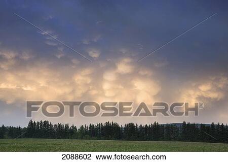 Clouds after a storm at sunset; thunder bay ontario canada View Large Photo Image Stock Image - Clouds after a storm at sunset; thunder bay ontario canada. Fotosearch