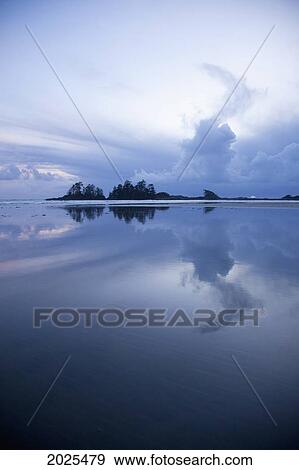 Clouds At Sunset Over Chesterman's Beach And Frank's Island Near Tofino; British Columbia Canada View Large Photo Image Stock Photo - Clouds At Sunset Over Chesterman's Beach And Frank's Island Near Tofino; British Columbia Canada. Fotosearch