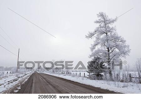 Country road in winter; thunder bay ontario canada View Large Photo Image Stock Photograph - Country road in winter; thunder bay ontario canada. Fotosearch