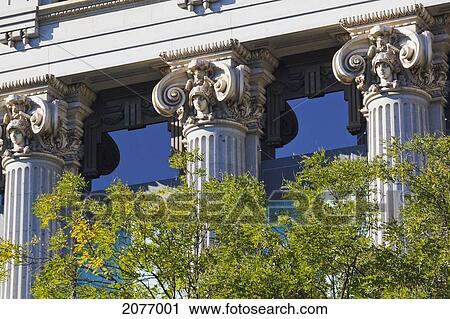 Stock Image - Decorative ionic capitals on columns of facade of instituto cervantes; madrid spain. Fotosearch