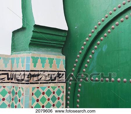 Detail on the door and tiles with arabic script; asilah morocco View Large Photo Image Stock Photograph - Detail on the door and tiles with arabic script; asilah morocco. Fotosearch