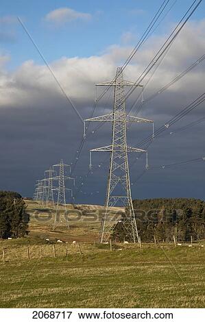 Stock Photo - Electric Power Transmission Line Suspended By Towers; Northumberland England. Fotosearch