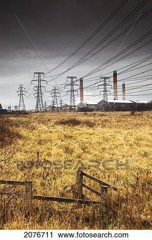 Electrical-power transmission lines through a field beside a residential area; northumberland england View Large Photo Image Stock Image - Electrical-power transmission lines through a field beside a residential area; northumberland england. Fotosearch