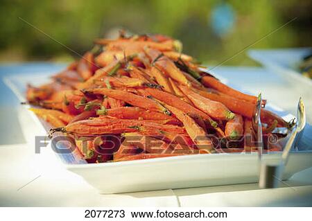 Elegant plate of cooked carrots at a wedding; vancouver british columbia canada View Large Photo Image Stock Image - Elegant plate of cooked carrots at a wedding; vancouver british columbia canada. Fotosearch