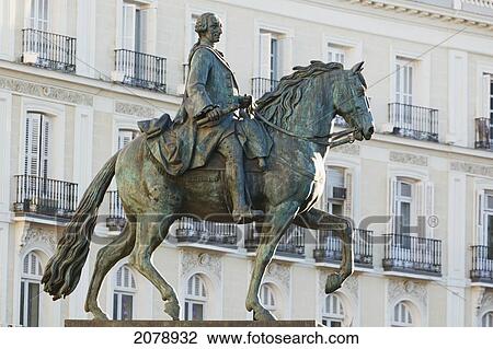 Equestrian statue of king carlos iii at puerta del sol; madrid spain View Large Photo Image Stock Image - Equestrian statue of king carlos iii at puerta del sol; madrid spain. Fotosearch