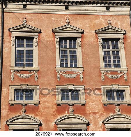Facade on a painted orange building in old town; stockholm sweden View Large Photo Image Stock Photo - Facade on a painted orange building in old town; stockholm sweden. Fotosearch