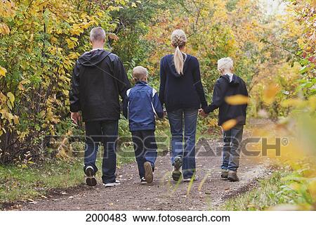 Family Walking Together On A Path In A Park In Autumn; Edmonton Alberta Canada View Large Photo Image Stock Image - Family Walking Together On A Path In A Park In Autumn; Edmonton Alberta Canada. Fotosearch