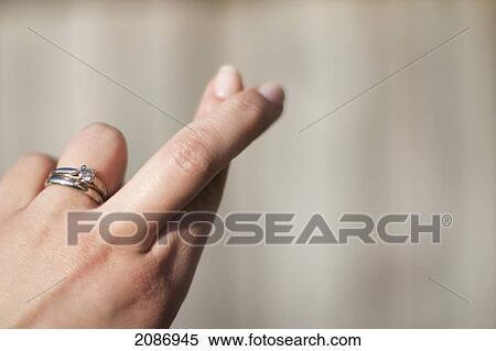 Fingers crossed; cambridge united kingdom View Large Photo Image Stock Photography - Fingers crossed; cambridge united kingdom. Fotosearch
