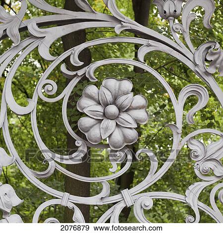 Flower and swirl design on a metal gate of the cathedral of the resurrection of christ; st. petersburg russia View Large Photo Image Stock Photo - Flower and swirl design on a metal gate of the cathedral of the resurrection of christ; st. petersburg russia. Fotosearch