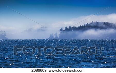 Fog surrounds the islands in broken island group on the west coast of vancouver island; british columbia canada View Large Photo Image Stock Photo - Fog surrounds the islands in broken island group on the west coast of vancouver island; british columbia canada. Fotosearch