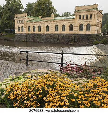 Fyris river and pump house with colourful flowers in the foreground; uppsala sweden View Large Photo Image Stock Photo - Fyris river and pump house with colourful flowers in the foreground; uppsala sweden. Fotosearch