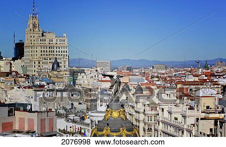 High view over centre of city the dome and angel of the metropolis building in the foreground; madrid spain View Large Photo Image Stock Photo - High view over centre of city the dome and angel of the metropolis building in the foreground; madrid spain. Fotosearch