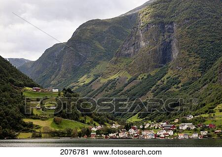 Houses in a valley along the water's edge; undredal sogn og fjordane norway View Large Photo Image Stock Image - Houses in a valley along the water's edge; undredal sogn og fjordane norway. Fotosearch