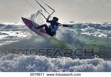 Stock Image - Kitesurfing; tarifa cadiz andalusia spain. Fotosearch