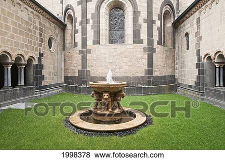 Stock Photo - Lion Fountain In The Paradise Romanesque Portico; Rhineland-Palatinate Germany. Fotosearch