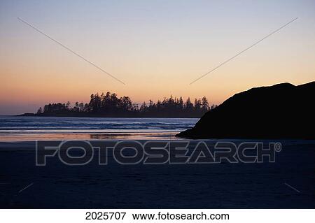 Stock Photo - Long Beach At Sunset A Surfer's Paradise In Pacific Rim National Park Near Tofino; British Columbia Canada. Fotosearch