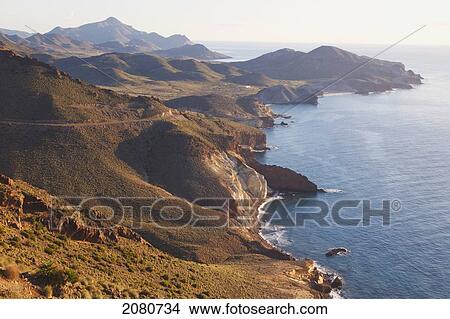 Looking east along the unspoiled coastline of cabo de gata-nijar natural park; almeria province spain View Large Photo Image Picture - Looking east along the unspoiled coastline of cabo de gata-nijar natural park; almeria province spain. Fotosearch