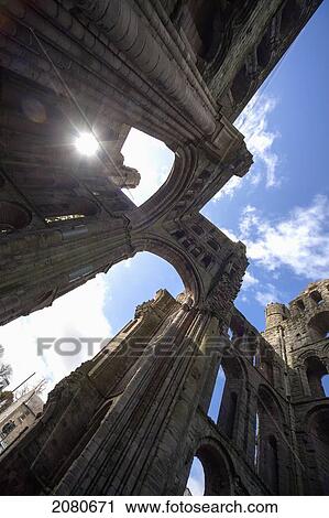 Low angle view of old walls with arches and a sunburst; kelso scottish borders scotland View Large Photo Image Stock Image - Low angle view of old walls with arches and a sunburst; kelso scottish borders scotland. Fotosearch
