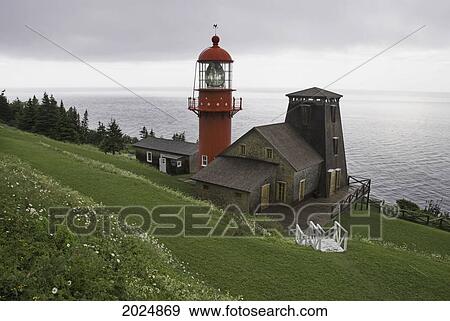 Stock Photo - Marconi Station And Pointe A La Renommee Lighthouse; Pointe A La Renommee Quebec Canada. Fotosearch