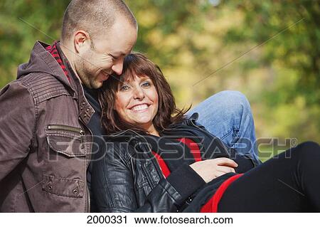 Stock Image - Newlywed Couple Enjoying Time Together; Edmonton Alberta Canada. Fotosearch