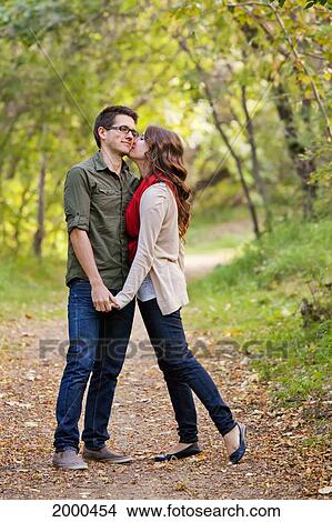 Picture - Newlywed Couple Spending Time Together In A Park In Autumn; Edmonton Alberta Canada. Fotosearch