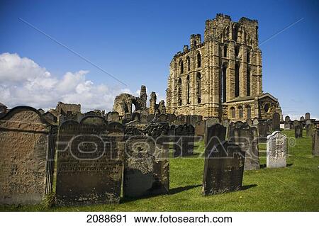 One white tombstone in a cemetery at the priory ruins; tynemouth tyne and wear england View Large Photo Image Stock Image - One white tombstone in a cemetery at the priory ruins; tynemouth tyne and wear england. Fotosearch