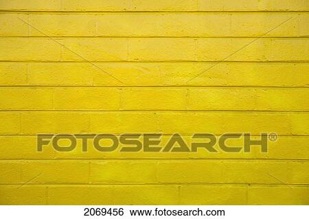 Stock Photograph - Painted Yellow Wall; Kirra Gold Coast Queensland Australia. Fotosearch