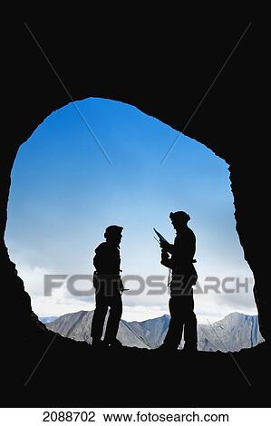 Participant's silhouettes at a cave rescue; blairmore alberta canada View Large Photo Image Stock Image - Participant's silhouettes at a cave rescue; blairmore alberta canada. Fotosearch