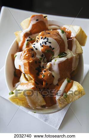 Patatas Bravas (Potatoes Fried) With Salmorejo And Alioli Sauce; Coolangatta Queensland Australia View Large Photo Image Stock Image - Patatas Bravas (Potatoes Fried) With Salmorejo And Alioli Sauce; Coolangatta Queensland Australia. Fotosearch