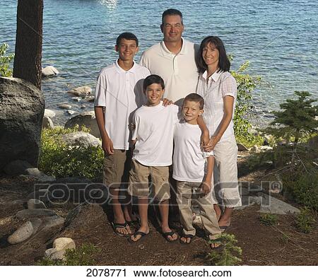 Stock Image - Portait of a family of five; lake tahoe california united states of america. Fotosearch