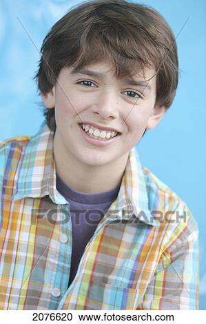 Portrait of a boy with brown hair and brown eyes wearing a plaid shirt; troutdale oregon united states of america View Large Photo Image Stock Image - Portrait of a boy with brown hair and brown eyes wearing a plaid shirt; troutdale oregon united states of america. Fotosearch