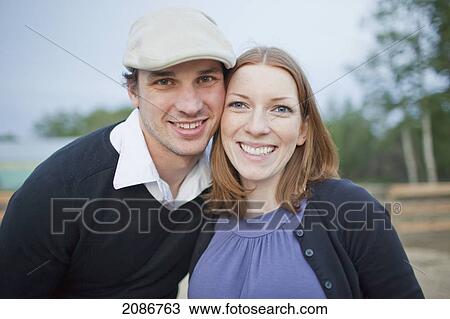 Portrait of a couple; sherwood park alberta canada View Large Photo Image Stock Image - Portrait of a couple; sherwood park alberta canada. Fotosearch