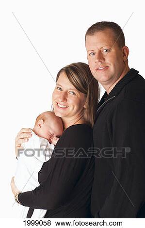 Portrait Of A Family With A Newborn Baby; Dundas Minnesota United States Of America View Large Photo Image Stock Photo - Portrait Of A Family With A Newborn Baby; Dundas Minnesota United States Of America. Fotosearch