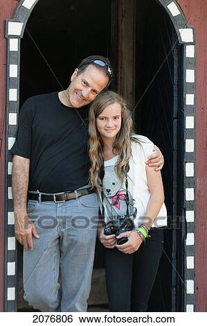 Stock Photograph - Portrait of a father and daughter; oslo norway. Fotosearch
