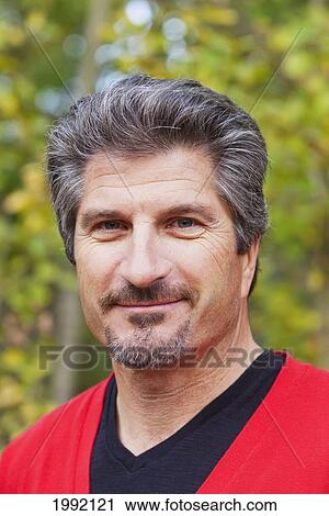 Stock Image - Portrait Of A Mature Man; St. Albert Alberta Canada. Fotosearch