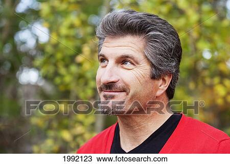 Portrait Of A Mature Man; St. Albert Alberta Canada View Large Photo Image Stock Image - Portrait Of A Mature Man; St. Albert Alberta Canada. Fotosearch