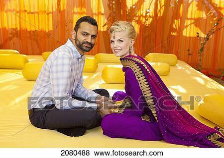 Portrait of a mixed race couple her wearing a sari; ludhiana punjab india View Large Photo Image Stock Photo - Portrait of a mixed race couple her wearing a sari; ludhiana punjab india. Fotosearch