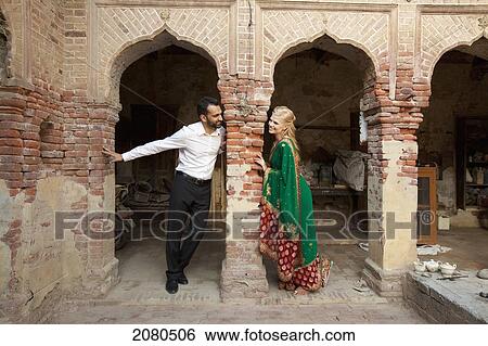 Portrait of a mixed race couple with her wearing a sari; ludhiana punjab india View Large Photo Image Stock Photograph - Portrait of a mixed race couple with her wearing a sari; ludhiana punjab india. Fotosearch
