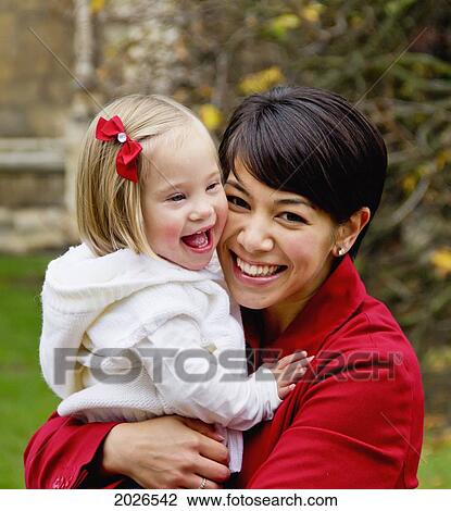 Portrait Of A Mother And Daughter Laughing; Cambridge England View Large Photo Image Stock Image - Portrait Of A Mother And Daughter Laughing; Cambridge England. Fotosearch