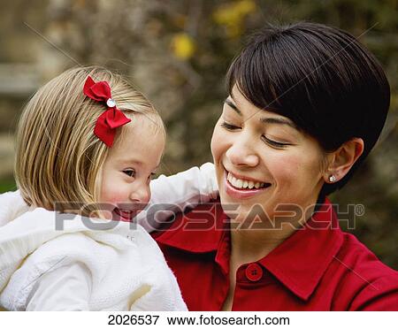 Stock Photo - Portrait Of A Mother And Her Daughter With Down Syndrome; Cambridge England. Fotosearch
