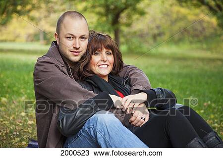 Portrait Of A Newlywed Couple In A Park; Edmonton Alberta Canada View Large Photo Image Stock Image - Portrait Of A Newlywed Couple In A Park; Edmonton Alberta Canada. Fotosearch