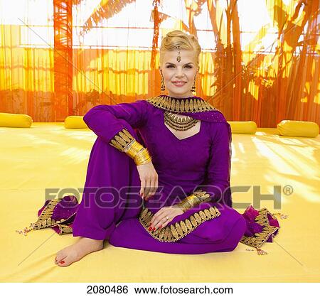 Portrait of a woman with blond hair wearing a purple sari; ludhiana punjab india View Large Photo Image Stock Photograph - Portrait of a woman with blond hair wearing a purple sari; ludhiana punjab india. Fotosearch