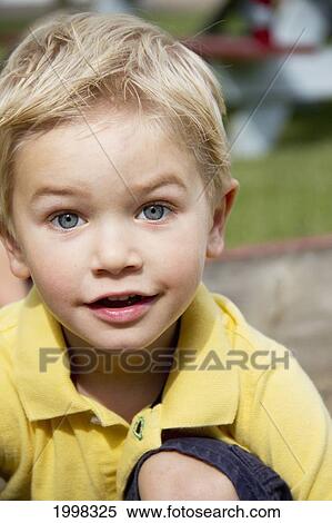 Portrait Of A Young Boy; Three Hills Alberta Canada View Large Photo Image Stock Photography - Portrait Of A Young Boy; Three Hills Alberta Canada. Fotosearch