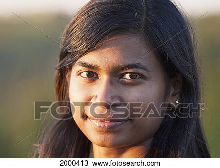 Portrait Of A Young East Indian Woman; Edmonton Alberta Canada View Large Photo Image Stock Image - Portrait Of A Young East Indian Woman; Edmonton Alberta Canada. Fotosearch