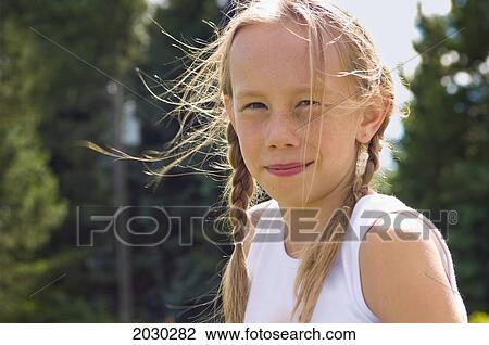 Stock Image - Portrait Of A Young Farm Girl; Edmonton Alberta Canada. Fotosearch