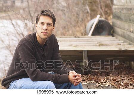 Portrait Of A Young Man; Spicer Minnesota United States Of America View Large Photo Image Stock Photography - Portrait Of A Young Man; Spicer Minnesota United States Of America. Fotosearch