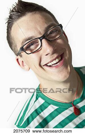 Portrait Of A Young Man Wearing Eyeglasses View Large Photo Image Stock Photo - Portrait Of A Young Man Wearing Eyeglasses. Fotosearch