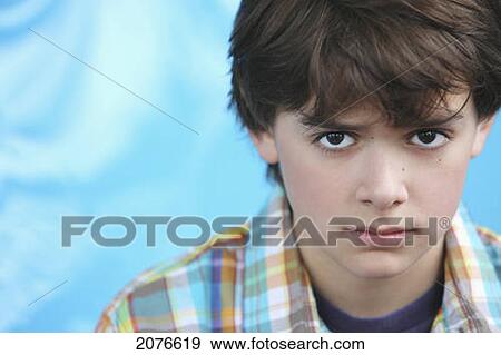 Portrait of boy with brown hair and brown eyes wearing a plaid shirt; troutdale oregon united states of america View Large Photo Image Stock Photo - Portrait of boy with brown hair and brown eyes wearing a plaid shirt; troutdale oregon united states of america. Fotosearch